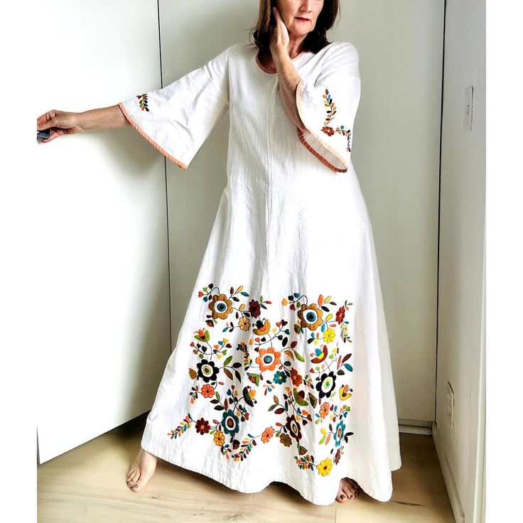 VTG 50s Casa Taxco Mexican Embroidered OffWhite Cotton Maxi Dress Bell Sleeve  Fits a size Small to Medium No Inner tags Pre-owned with some discoloration/staining throughout (pictured) Measures Flat Bust 21.5" Hips 24" Waist 20" Length 56" Sleeves 17.5" Models is 5'5" Tall #mexicanembroidery #embroidereddresses #maxidress #vintage50sdress #vintagedresses #Handembroidery #bohemian #beachwedding #hippiedress #curatedvintage Jl24 1.8 Fitted White Embroidered Dress With Embroidered Hem, Fitted White Embroidered Dress With Chikankari, Fitted White Dress With Chikankari Embroidery, White Floral Embroidered Dress For Wedding, White Embroidered Hem Wedding Dress, White Wedding Dress With Embroidered Hem, Vintage Embroidered Dress For Spring, Vintage White Embroidered Dress For Spring, Vintage White Embroidered Dress