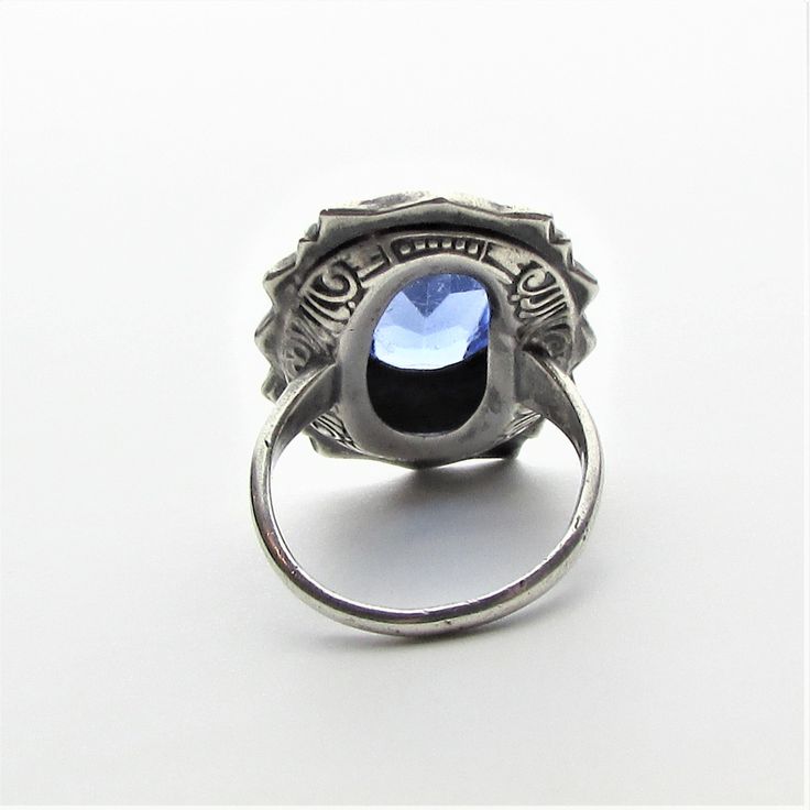 "Victorian marcasite, art glass cabochon and sterling silver statement ring, perhaps originally a mourning ring! This ring appears to be from the latter part of the 1800's and per the gemologist was typically worn with those high collared long black dresses of the period that one sees in old photos and many times as a mourning ring (also known as a memory ring). It is a large piece with the crown measuring approximately 25 mm by 19 mm. and rising a comfortable 7.5 mm from the finger to the very Vintage Gemstone Jewelry For Memorial, Antique Hallmarked Oval Cabochon Rings, Antique Oval Collectible Rings, Art Deco Cabochon Ring For Anniversary, Art Nouveau Gemstone Ring Jewelry, Art Nouveau Gemstone Jewelry, Victorian Oval Collectible Rings, Art Deco Hallmarked Ring With Oval Cabochon, Victorian Engraved Rings For Memorial