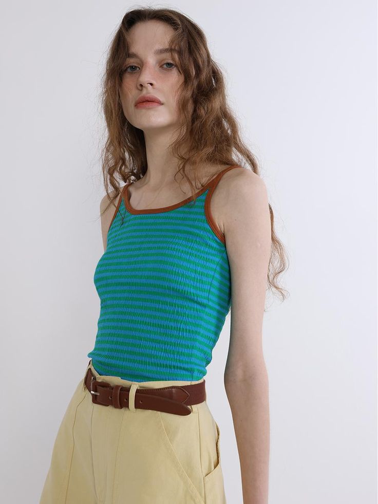 This is a modern and comfortable top by GREENBUTTER that is made out of high quality and sturdy fabric. With unique design detail and trendy mood, you can style it for your casual and young daily outfit.- Tentar and tumble washed fabric- Deep back neckline- Wrinkle processed fabric- Double inner chest line Casual Green Sleeveless Top, Casual Green Stretch Tank Top, Trendy Green Tank Top, Green Cotton Tank Top, Trendy Green Sleeveless Tank Top, Casual Green Vest Top, Green Cotton Vest Top, Green Sleeveless Top For Day Out, Green Tops For Everyday Summer Wear