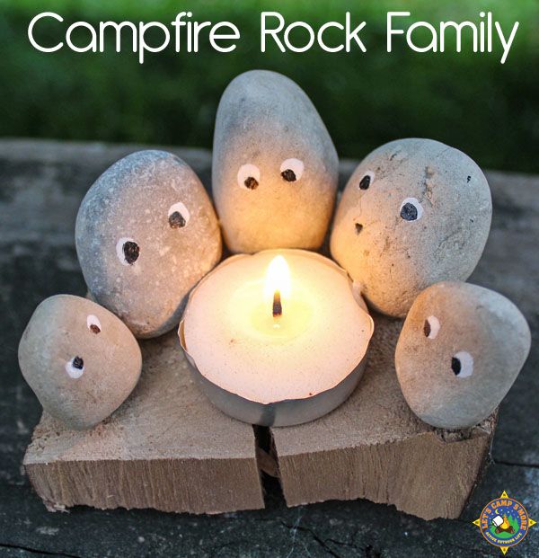 the campfire rock family is lit up with a candle