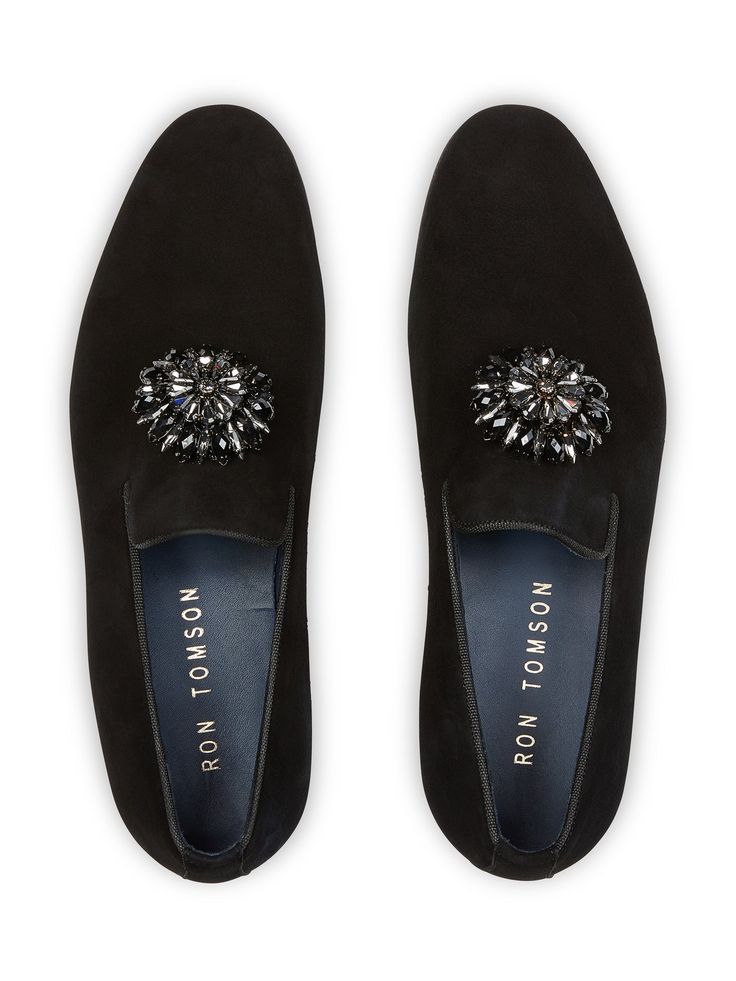 This plush black version of the timeless 'loafer' has been hand crafted from flawless suede leather, embellished with a leather insole that nods to the brand's heritage. Perfectly paired with a tailored suits, leather jackets or a tuxedo on a red carpet. Stacked heel. Chrystal brooch Leather Lining for a luxurious feel and moisture control Leather sole Tapered round toe. Slip-on style. The handmade leather outsole and insole are Made in Italy. Black Suede Loafers, Suede Loafers, Los Angeles California, Stacked Heel, Keds, Leather Loafers, Leather Handmade, Black Suede, Suede Leather