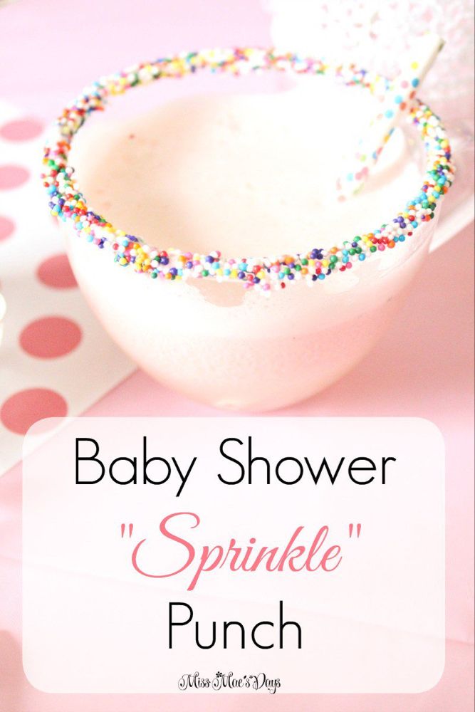 a baby shower drink with sprinkles on the rim and in a glass