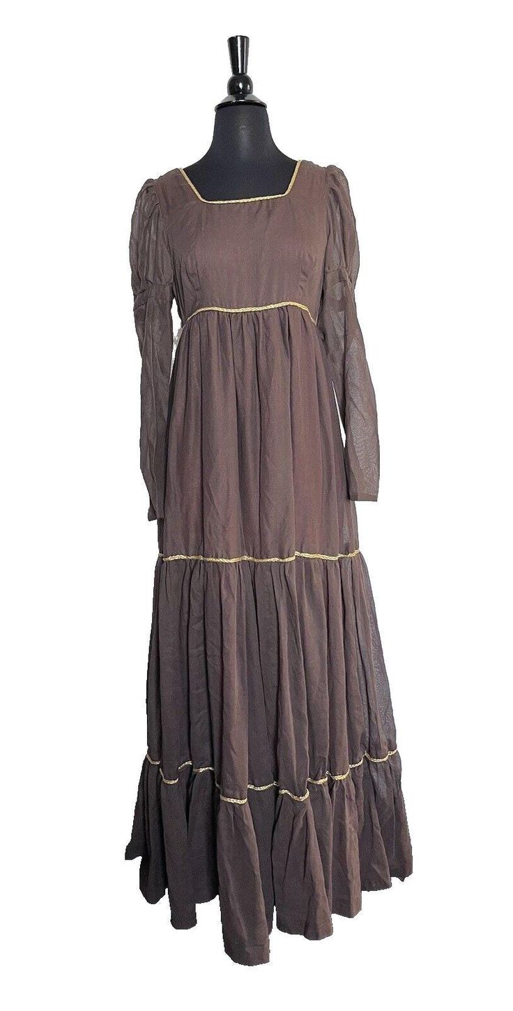 Vintage 70s Prairie Brown Maxi Dress M/L Gauzie ruffled Boho Cottagecore. Hand made. Missing size tag. Please see pictures with measurements. Measures like a large. Good used vintage condition. See pictures SKU: Rack-1 Vintage Brown Maxi Dress For Fall, Vintage Brown Long Sleeve Maxi Dress, Retro Brown Dress With Ruffles, Vintage Ruffled Dress For Fall, Vintage Flowy Dress With Ruffle Hem, 1970s Vintage Long Sleeve Dress With Ruffles, Retro Ruffled Dresses For Fall, Vintage Flowy Maxi Dress For Fall, Flowy Vintage Maxi Dress For Fall