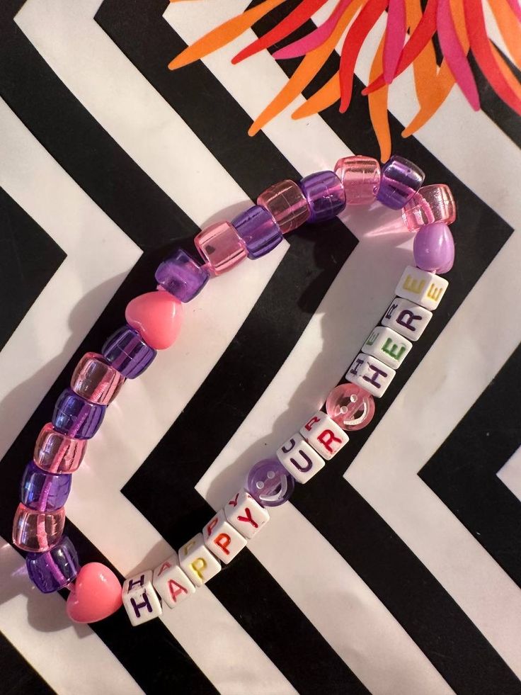 Welcome to my "Kandi Shop" ! Dive into the vibrant world of rave culture with our unique collection of Kandi and trinkets! We offer an array of handcrafted Kandi bracelets, necklaces, and trinkets perfect for any raver or festival-goer. Whether you're looking for a single piece to complete your outfit or a curated package to share with friends, we've got you covered. Our Products Include: Kandi Singles: Unique, colorful beads strung together to create beautiful, one-of-a-kind bracelets. Kandi Pa Rave Candy Bracelets Edm, Customized Adjustable Playful Jewelry, Playful Customized Adjustable Jewelry, Customized Playful Friendship Jewelry, Customized Playful Jewelry For Friendship, Customizable Playful Bracelet Jewelry, Personalized Pink Jewelry For Festivals, Spiritual Pink Jewelry For Birthday, Colorful Fun Jewelry Gift