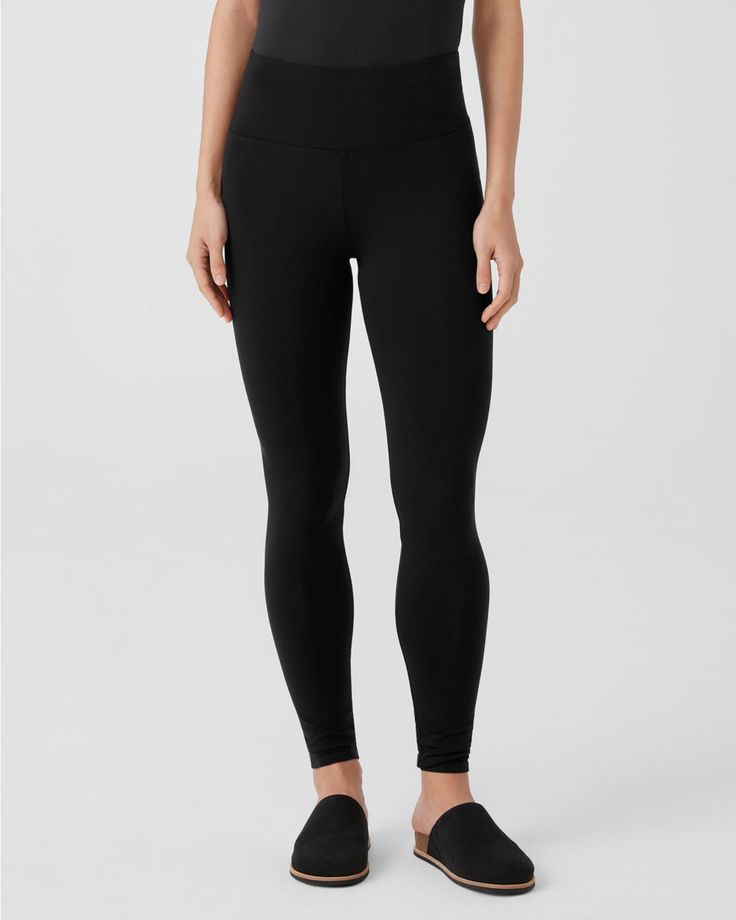 Everyday essential leggings, featuring the support of a high waist, the comfort of a slim waistband, and the style of an ankle-baring length. Irresistibly soft, lightweight, and fluid in a body-skimming, sustainable TENCEL™ Lyocell jersey knit.  By EILEEN FISHER. Pull-on style. High Rise 4-way Stretch Leggings, Versatile High Rise Compressive Pants, High Rise Compressive Leggings, Bottoms With Smoothing Minimal Stretch For Yoga, Compressive High-rise Yoga Pants With Wide Waistband, Smoothing Yoga Bottoms With Minimal Stretch, Versatile High Rise 4-way Stretch Leggings, Mid-rise Compressive Go-dry Leggings, Athleisure Activewear With Elastic Waistband And Minimal Stretch