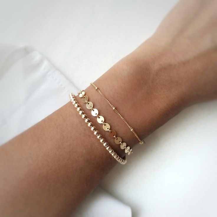 Handmade in Toronto, Canada Perfect on its own or as a bracelet stack. No need to take it off as it's 14k gold plated and water resistant. Length: 6.5" plus a 1" extenderCoins measure 4mm diameter Cuff Bracelets Silver, Coin Anklet, Minimalist Ear Cuff, Coin Choker, Birthstone Charm Necklace, Coin Bracelet, Stacked Necklaces, Gold Bead Bracelets, Stacked Jewelry