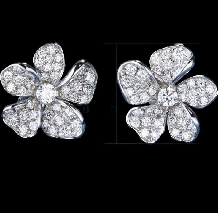 A pair of lovely and dainty flower earrings are pave cut and have a center rhinestone. The color is silver. They measure a little over .5 inches. They make a very nice give for someone special. All earrings are mailed USPS First Class in a gift box and wrapped. If you need any other special way, please let us know in the Comments area and we will try to accomodate. An extra fee may be imposed. Thank you for looking at our Etsy.com shop. Eyeball Earrings, Big Dangle Earrings, Mickey Earrings, Wire Hoop Earrings, Long Pearl Earrings, Gift Flower, Earrings Bridesmaid, Flower Girl Gifts, Flower Stud Earrings