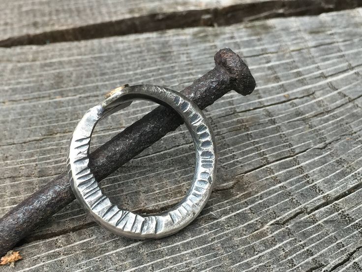 This mixed metals ring was forged by hand and flame from .925 Sterling silver. It features a thick, rugged band with lots of interesting & organic texture. The grain elements on top are made of 14K gold, with the largest being .999 fine silver. This is one of my absolutely favorite rings. It has such a comfortable & smooth feel. It has a nice weight that's substantial without being too chunky. FREE SHIPPING! READY TO SHIP! <3 This ring style is suitable for both men and women and make Artisan Ring With Oxidized Finish, Brutalist Oxidized Finish Ring For Gift, Modernist Silver Ring With Oxidized Finish, Silver Brutalist Hammered Ring, Brutalist Sterling Silver Rings With Oxidized Finish, Alternative Wedding Bands, Wedding Band Unique, Mixed Metal Rings, Metalwork Jewelry