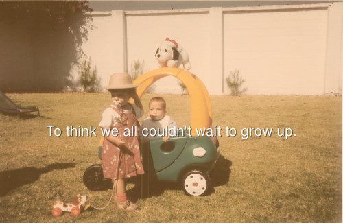 two small children standing in front of a toy car with a dog on top and the words to think we couldn't wait to grow up