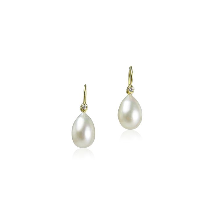 Gold & Stone Earrings - These petite pearl dangles are fabricated in recycled 18k yellow gold. They feature two 2mm Harmony recycled diamonds (G-I color, SI clarity), with a total carat weight of .05ct, and two 7.5-8mm Chinese freshwater pearl drops. (Because it is a natural material, there may be some variation in the shape of the pearls.) The earrings are hinged between the diamond French wire and the pearl dangle to give the earrings some movement. Yellow Gold Diamond Earrings With Pearl Drop, Classic Teardrop Earrings With Single Diamond, Teardrop Pearl Drop Diamond Earrings For Anniversary, Anniversary Teardrop Pearl Drop Diamond Earrings, Anniversary Teardrop Diamond Earrings With Pearl Drop, Fine Jewelry Teardrop Pearl Drop Diamond Earrings, Fine Jewelry Teardrop Diamond Earrings With Pearl Drop, Yellow Gold Akoya Pearl Pear Earrings, Yellow Gold Diamond Dangle Pearl Earrings