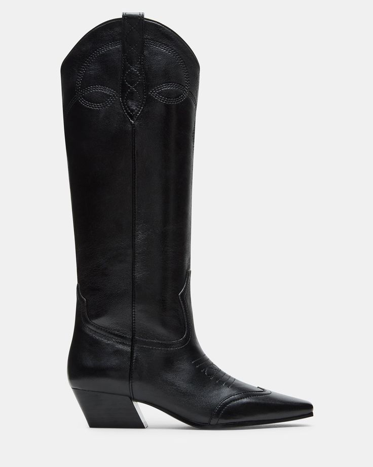 The DOLLIE Western boot offers a sleek and stylish design with a square toe. Experience comfort and durability with every step. Elevate your wardrobe with this timeless and versatile statement piece. 1.75 inch heel height Size 6 measurements: 15 inch shaft circumference, 13 inch shaft height Size 8 measurements: 16 inch shaft circumference, 14 inch shaft height Size 10 measurements: 17 inch shaft circumference, 14.75 inch shaft height Leather upper material Textile and synthetic lining Synthetic Classic Wide Calf Heeled Boots With Square Toe, Classic Wide Calf Boots With Square Toe, Classic Square Toe Wide Calf Heeled Boots, Knee-high Boots With Reinforced Heel And Square Toe, Classic Wide Calf Mid-calf Boots With Square Toe, Classic Wide Calf Mid-calf Boots With Reinforced Heel, Knee-high Boots With Stacked Heel And Snip Toe, Classic Wide Calf Low Heel Boots, Classic Wide Calf Heeled Boots With Low Heel