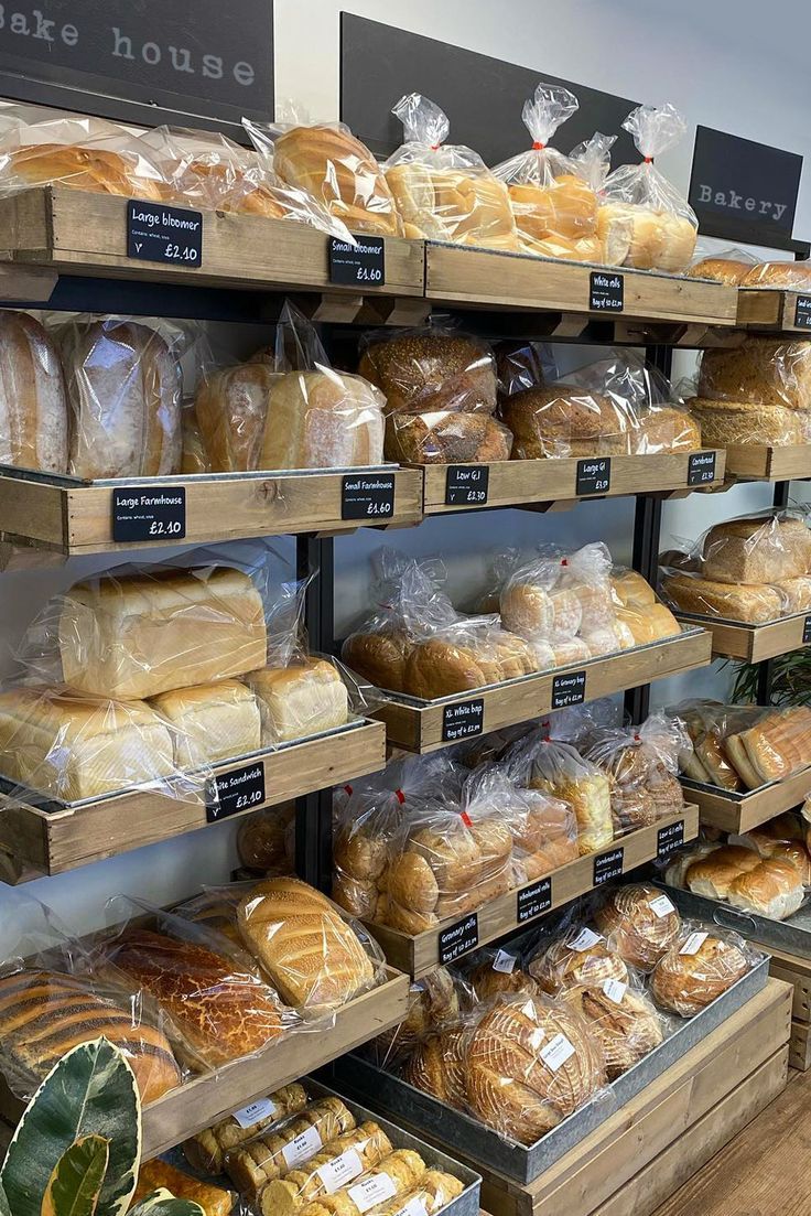 breads and pastries on display in a bakery