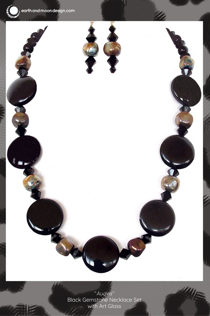 This stunning high fashion necklace would make a fabulous gift for a stylish collector. Snap up this chic black gemstone set today. Elegant Jewelry With Round Pendant And Natural Stones, Elegant Long Crystal Necklace For Gift, Luxury Polished Beads Jewelry For Party, Formal Gemstone Beads Necklace, Elegant Black Beaded Necklaces With Stones, Formal Round Polished Bead Jewelry, Round Stones Costume Jewelry, Formal Polished Round Bead Jewelry, Chic Formal Gemstone Jewelry