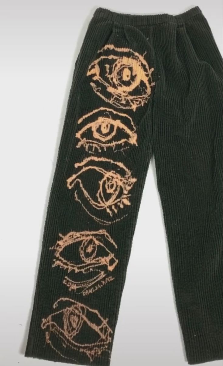 a pair of pants with eyes drawn on them