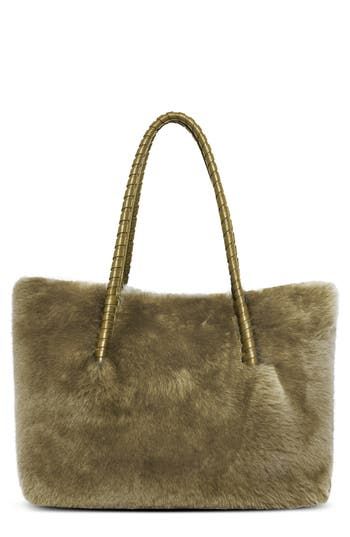 Carry your essentials in style with this luxe tote crafted from plush genuine shearling and fashioned with multiple pockets for maximum organization. Magnetic-snap closure Top carry handles Interior wall pockets; water bottle pocket; key fob Lined Genuine shearling (India) Imported Luxury Winter Shoulder Bag For Shopping, Luxury Sheepskin Bags With Faux Fur Lining, Luxury Bags With Faux Fur Lining For Winter, Luxury Faux Fur Shoulder Bag With Fur Lining, Luxury Faux Fur Rectangular Shoulder Bag, Luxury Faux Fur Shoulder Bag, Elegant Winter Shoulder Bag With Faux Fur Lining, Luxury Rectangular Faux Fur Shoulder Bag, Luxury Faux Fur Shoulder Bag For Everyday Use