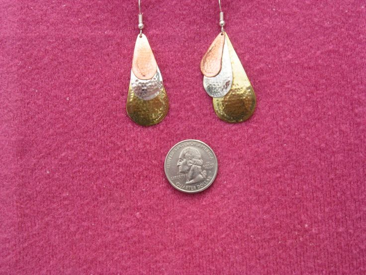 Hammered sterling silver, solid copper, and solid brass teardrop shapes with sterling ear wires. There are 2 sizes available. Select medium which is 1&3/4 inches long including the sterling ear wire, or large, about 2 & 1/4 inches long including the sterling silver ear wire. One of the photos shows the two sizes side by side. Shipped in a gift box to protect during shipping.. Bronze Metal Teardrop Earrings, Copper Teardrop Jewelry With Matching Earrings, Teardrop Copper Jewelry With Matching Earrings, Teardrop Copper Jewelry Set With Matching Earrings, Nickel-free Bronze Teardrop Earrings, Nickel-free Bronze Teardrop Jewelry, Hammered Bronze Teardrop Earrings, Bronze Hammered Teardrop Earrings, Bronze Teardrop Earrings With French Hook