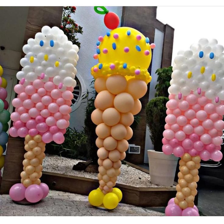 some balloons that are shaped like ice cream cones