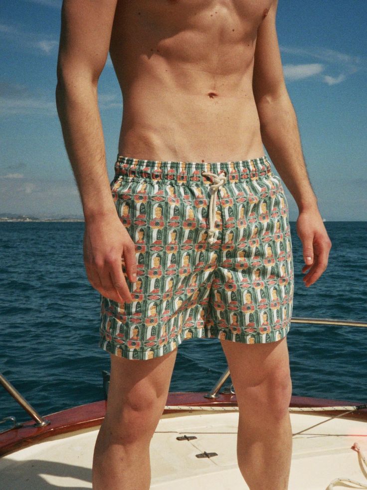 The classic swimsuit was redesigned for a more elegant, tailored look and a comfortable fit. Made from soft, brushed fabric that is quick-drying and has a distinctive cotton-feel. Tying-cord made from braided nautical rope in unbleached cotton. Pattern drawn by hand. Made in Italy. Two side pockets with water outlets Fine-mesh interlining Brushed 100% polyester fabric Signature label on rear waistband Comes in natural linen travel-bag Straight fit, size up if in between sizes Model is 187 cm tal Classic Swimsuit, Rick Owens Jacket, Nautical Rope, John Lobb, Retro Designs, Pattern Drawing, Tory Burch Shoes, Natural Linen, Swim Trunks