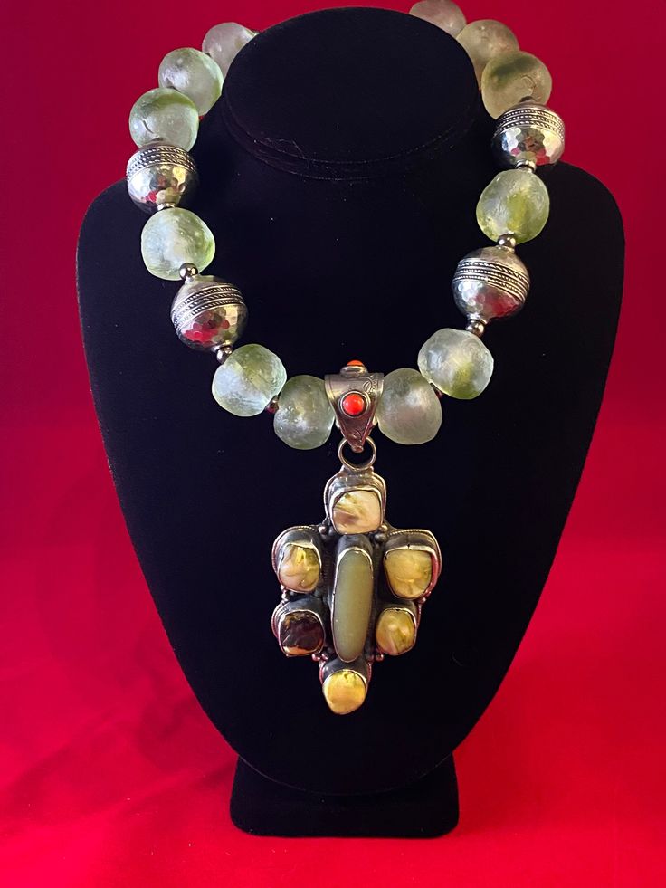 Green is very fashionable this Fall & this Necklace makes a BIG Statementalso has a sterling silver clasp with 5 rings. This beauty is a bit heavy Statement Hat, Green Pendant, Green Pendants, Beads Pendant, Buddha Pendant, 5 Rings, Beaded Pendant, Green Glass, Shades Of Green