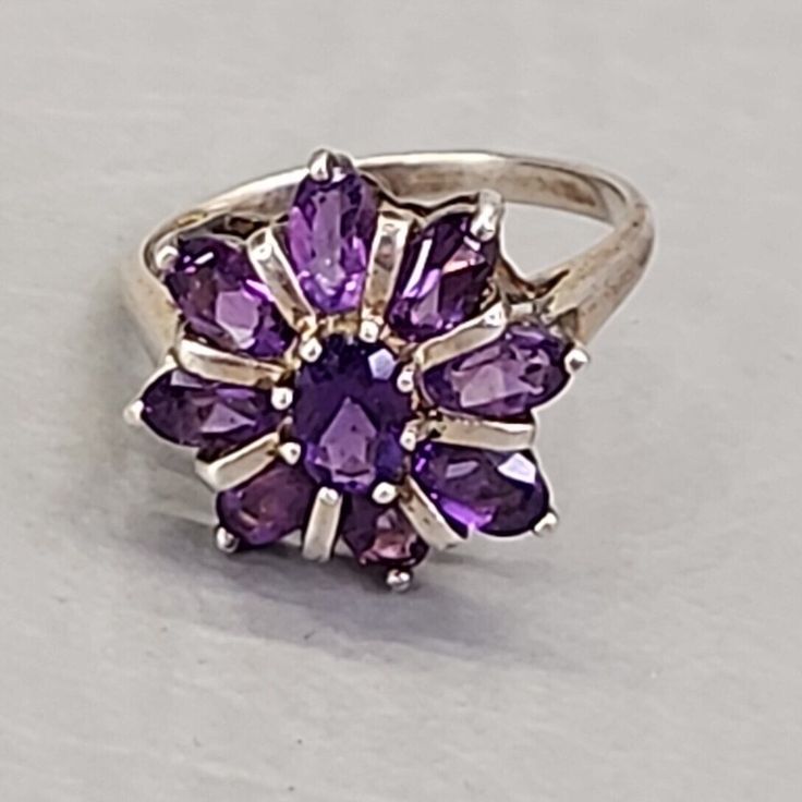 Check out Flower Ring Purple Amethyst Stones Sterling Silver 925 Sz 7, the latest item I added on eBay! #eBay #eBaySeller Polished Amethyst Ring For Anniversary, Polished Amethyst Anniversary Ring, Silver Polished Amethyst Ring, Silver Amethyst Ring With Polished Finish, Round Multi-stone Amethyst Ring, Classic Hallmarked Cluster Ring, Sterling Silver Polished Amethyst Ring, Classic Silver Multi-stone Gemstones, White Gold Multi-stone Amethyst Ring