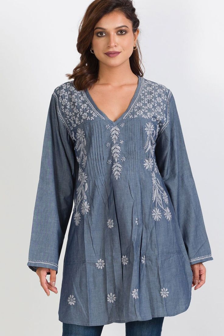 Traditional Indigo Embroidered Kurta, Traditional Embroidered Indigo Kurta, Festive Cotton Embroidered Dress With Woven Motifs, Traditional Indigo Kurta With Floral Embroidery, Traditional V-neck Floral Embroidered Dress, Traditional V-neck Top With Resham Embroidery, Traditional Resham Embroidered V-neck Top, Bohemian Cotton Blouse With Tonal Embroidery, Indigo Kurta With Floral Embroidery And Long Sleeves