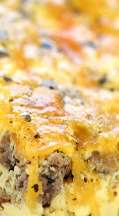 a cheesy casserole with meat and cheese on it is ready to be eaten