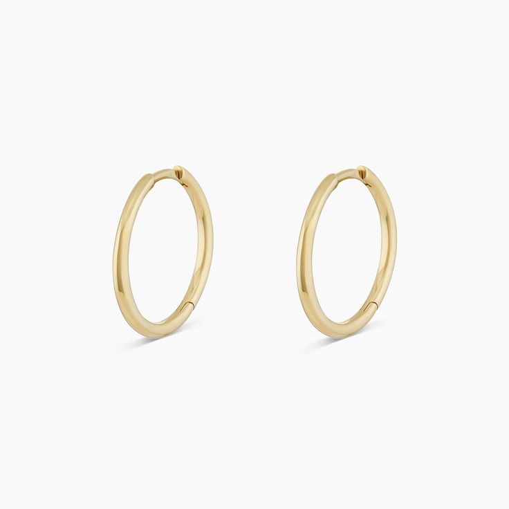 An instant classic - small 14k gold hoop earrings made for everyday stacking. Wear solo or mix & match with your favorite earring or diamond studs. Make it a single Product Details 14k solid gold 15 mm profile diameter and 1.2 mm wide Hinge closure | Classic 15 Mm Hoops Earring in 14K, Women's by Gorjana Gorjana Jewelry, 14k Gold Hoop Earrings, Black Labradorite, Small Gold Hoops, Orange Agate, Yellow Opal, Iridescent Crystal, Classic Earrings, Pink Enamel