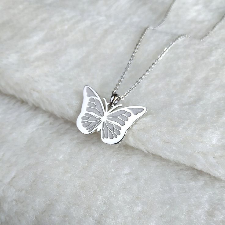 White Charm Necklace For Birthday, White Charms Necklace For Birthday Gift, Butterfly Necklace As A Gift, Round Butterfly Necklace Gift, Round Butterfly Necklace For Gift, Handmade White Charm Necklaces For Birthday Gift, Silver Clavicle Chain Necklace For Christmas, White Gold Necklaces With Charms For Gift, White Pendant Charm Necklace For Birthday