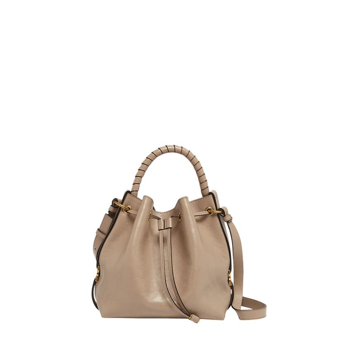 Chloe "Marcie" bucket bag in shiny calfskin  Rolled top handle  Adjustable crossbody strap Can be worn as a top handle or crossbody bag  Drawstring closure  Lining: Leather Approx. 9.4"H x 10.2"W x 5.9"D Made in Italy Designer Bucket Satchel With Handle Drop, Luxury Bucket Bag Satchel With Handle Drop, Evening Bucket Satchel With Handles, Luxury Bucket Satchel With Detachable Handle, Evening Bucket Satchel, Luxury Bucket-shaped Hobo Bag With Handle Drop, Luxury Crossbody Bucket Bag With Top Handle, Evening Bucket Satchel With Detachable Handle, Leather Bucket Bag For Everyday Luxury