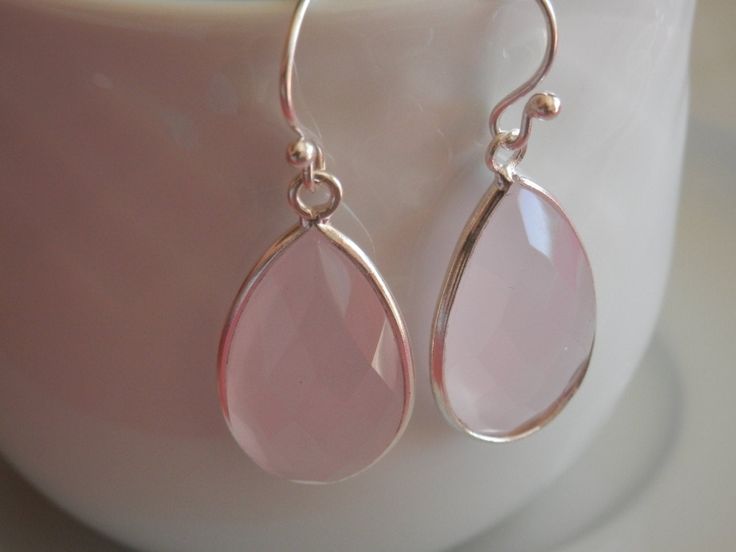 Rose quartz Earrings pink quartz earrings silver earrings silver drop earrings rose quartz drop earrings dangle earrings quartz crystal earrings Beautiful rose quartz earrings with all metal details of sterling silver 925. Lovely faceted gems that reflect light and give your face a special brightness! A great choice for you or to give as a sweet gift to someone you love. The rose quartz gems are set in solid sterling silver 925 bezels and measure 1,2*2cm or 0,5*0,8 in Full earring length: 1,5 in Rose Quartz Teardrop Jewelry, Feminine Sterling Silver Dangle Jewelry, Elegant Rose Quartz For Jewelry Making, Pink Gemstone Drop Earrings, Pink Rose Quartz Jewelry With Ear Wire, Pink Faceted Earrings For Gift, Pink Drop Jewelry With Matching Earrings, Pink Jewelry With Ear Wire For Her, Elegant Pink Sterling Silver Teardrop Earrings