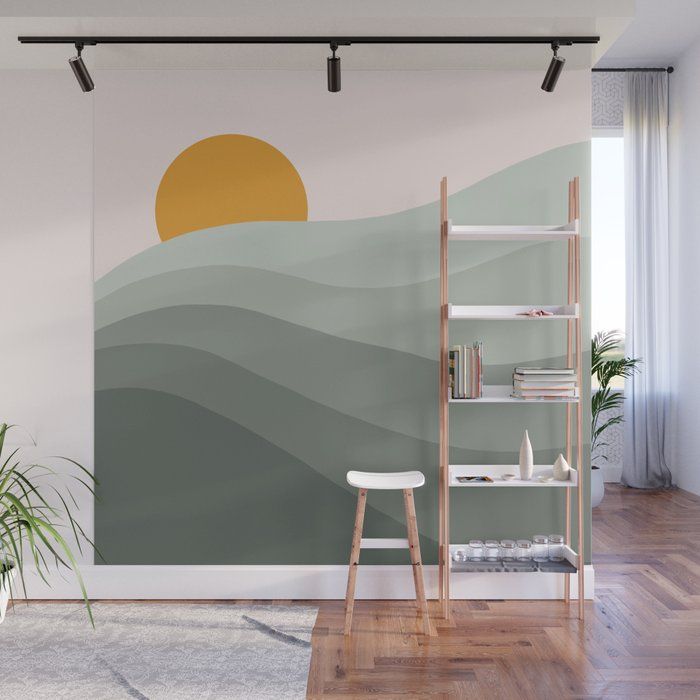 a room with a large wall mural in pastel colors and a ladder leaning against the wall