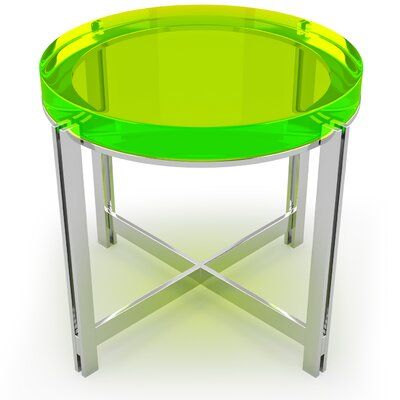 a green glass table with chrome legs on an isolated white background for use as a side table