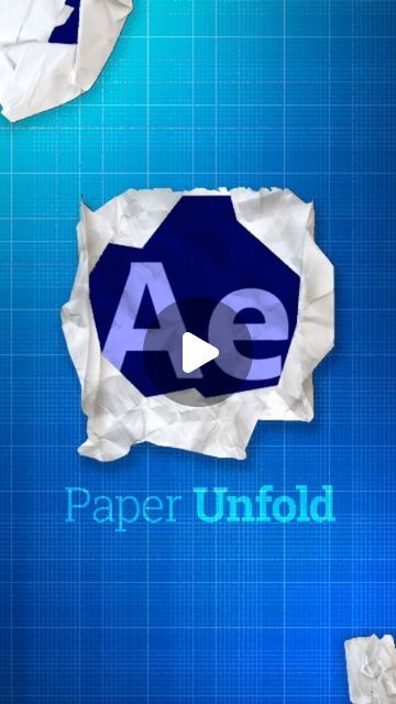 paper unfolded on a blue background with the word ae in it's center