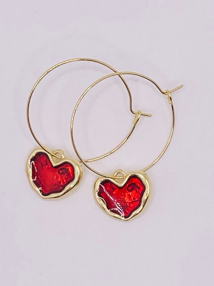 Red heart hoop earrings, gold and red heart earrings, heart hoop earrings, gold and red heart hoop earrings, valentine earrings, valentines gift These heart earrings measure 1.25 inches in diameter and the heart charm is 1/2 inches These earrings are very pretty and would make a perfect gift for that special person on Valentine's Day. Red Hoop Earrings, Valentine Earrings, Red Heart Earrings, Valentines Earrings, Heart Hoop Earrings, Earrings Heart, Gold And Red, Hoop Earrings Gold, Valentines Gift