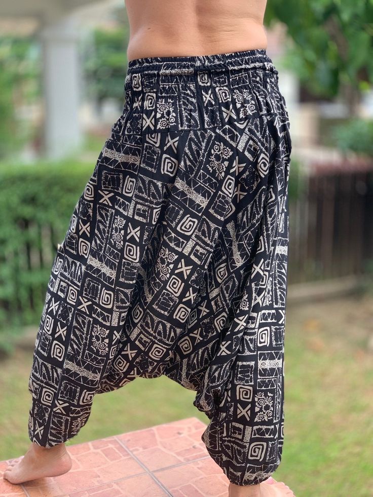 "⬇️ SHOP HERE https://www.etsy.com/ch-en/shop/IndycraftsDesigns Aladdin Pants, Harem Pants 100% Cotton Unisex pants, perfect for yoga, The pants have smock waist (wide bang elastic) The fabric is cotton soft, lightweight, and airy, ideal for those warm days. If it's a bit chilly, you could always wear leggings underneath. super comfortable cotton pants made of light, comfortable to wear cotton. The ideal pants for leisure, sport and wherever it should be loose and comfortable *Special features: Bohemian Bottoms With Elastic Waistband And Tapered Leg, Bohemian Tapered Leg Bottoms With Elastic Waistband, Bohemian Baggy Pants With Tapered Leg, Traditional Black Wide Leg Bottoms, Traditional Baggy Trousers, Traditional Baggy Ankle-length Bottoms, Traditional Bottoms With Pockets In Long Pants Style, Traditional Long Pants Bottoms With Pockets, Bohemian Cotton Harem Pants With Tapered Leg