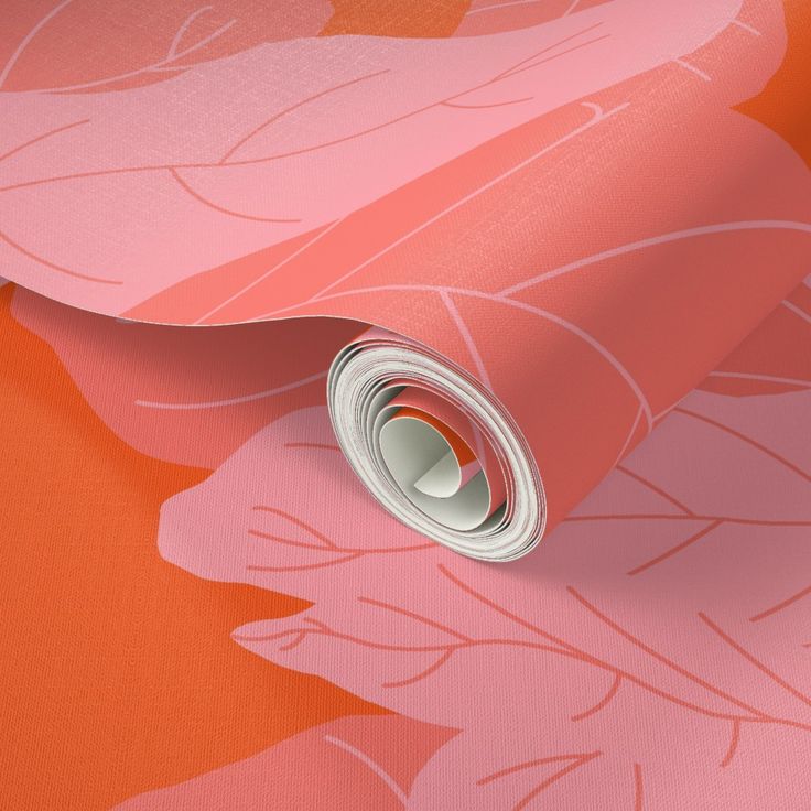 an orange and pink wallpaper with leaves on it