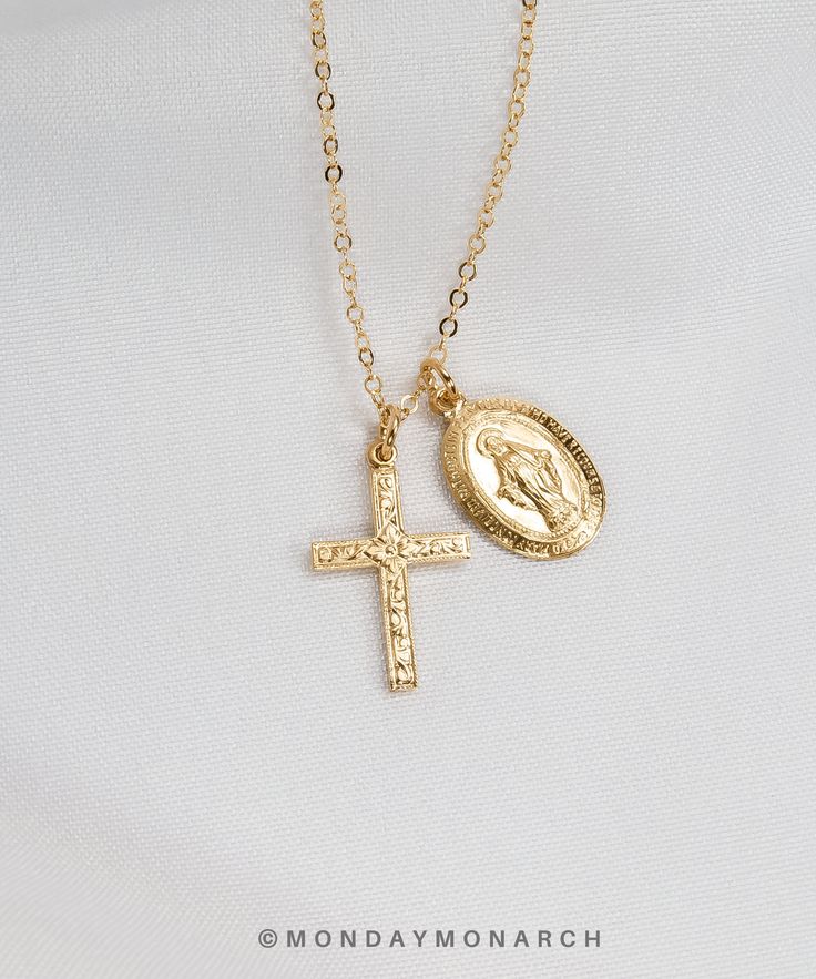 "Pretty duo CROSS and Virgin MARY necklace ♡ Gentle and sparkly, great for layering or as a cute gift for your loved one :) MATERIALS * Comes in Gold Filled and Sterling Silver. * Delicate high quality chain, jump rings and clasp. * Dainty cross charm 16mm in length, virgin Mary charm 15mm in length. LENGTH * Comes in one size 16\"+ 2\"= 18\" in total. * You can measure your neck for your perfect length, the standard length is 18\". PACKAGING & GIFTS We will package your order in a beautiful Dainty Charm Necklaces With Miraculous Medal As Gift, Dainty Charm Necklaces With Miraculous Medal For Gifts, Dainty Miraculous Medal Charm Necklaces As Gifts, Dainty Miraculous Medal Charm Necklace As Gift, Mary Necklace Silver, Silver Cross Necklace Woman, Small Cross Necklace, Cross Necklace Women, Mary Necklace