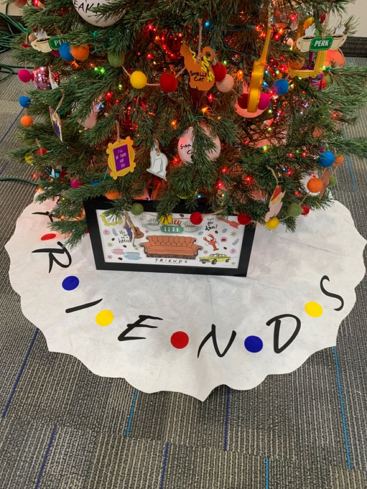 a decorated christmas tree with the words friends on it