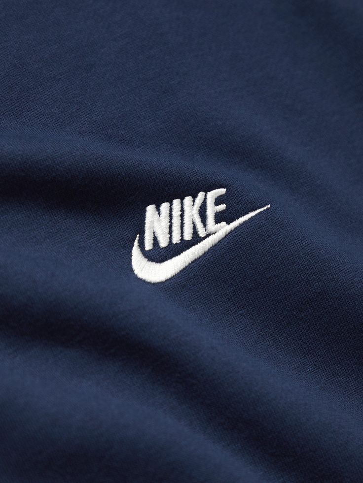 Nike's sweatshirt is simple and sporty. Made from soft cotton-blend jersey, it's embroidered with the brand's moniker at the chest. Blue Logo Sweatshirt For Streetwear, Navy Top With Embroidered Logo For College, Nike Crew Neck Hoodie With Logo Print, College Crew Neck Sweatshirt With Logo, Casual Blue T-shirt With Letter Embroidery, Nike Cotton Tops With Logo, Nike Cotton Top With Logo, Sports Season Sweatshirt With Logo And Long Sleeves, Sporty Logo Tops For College