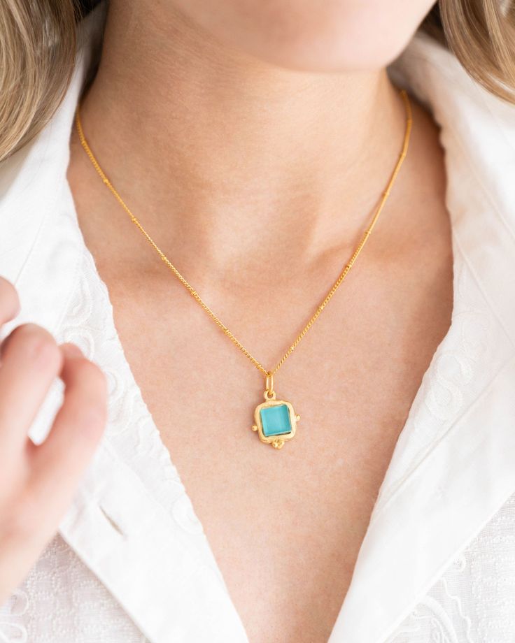 Bright French glass set in hand cast gold on a dainty gold chain. 

Triple plated 24K gold
French glass
Handmade in San Antonio, TX