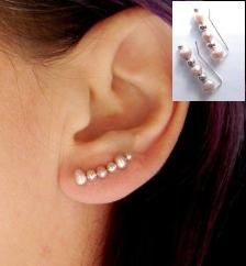 an image of a pinterest page with ear piercings on the left side