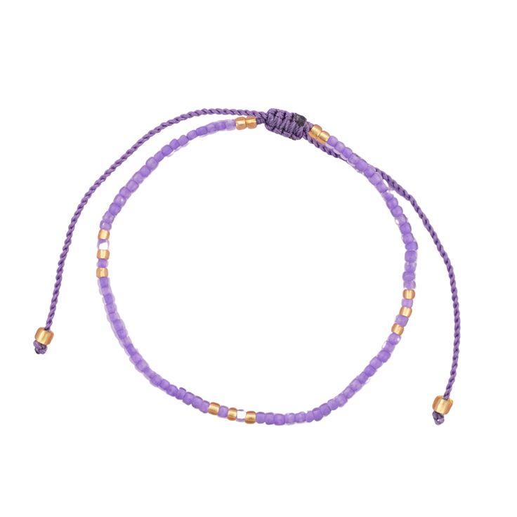 Get ready to dive into a world of purple paradise with our fabulous Purple Beaded String Bracelets, straight from the heart of Bali's artisanal scene! Handcrafted with passion and flair, each bracelet is a burst of color and creativity, designed to make you stand out in style. Choose from a dazzling array of purple hues and styles, from lilac purple to bright indigo—there's something for every taste and mood. Mix and match to create your own unique stack or share the love with your friends by gifting them as friendship bracelets! Our adjustable design ensures a comfortable fit for everyone, so you can dance, play, and live your best life with ease. Whether you're stacking them up or rocking them solo, these vibrant accessories are sure to turn heads and spark conversations wherever you go. Spiritual Beaded Bracelets With Sliding Knot For Beach, Spiritual Friendship Bracelets With Tiny Beads For Festivals, Festival Hand-strung Friendship Bracelets With Round Beads, Festival Friendship Bracelets With Hand-strung Beads, Adjustable Colorful Beads Wrap Bracelet, Adjustable Tiny Beads Wrap Bracelet Gift, Adjustable Beaded Bracelet With Tiny Beads As Gift, Adjustable Tiny Beads Bracelets As Gift, Adjustable Tiny Bead Bracelets Gift