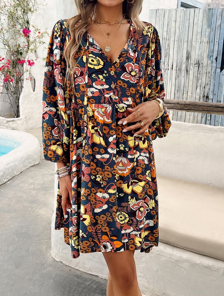 Our Athena floral mini dress is perfect for unleashing your inner bohemian goddess. With its unique floral design and playful silhouette, you'll feel like you're dancing in a field of flowers. The Athena dress is the perfect blend of comfort, style, and fun. Size Guide: Model is 5’65” tall, and has a 33.2” bust, 26.4” waist, & 35.2” hips. She is wearing a S / US 4 / AU 8. This dress is true to size. Material: 100% Rayon. Feature: Mini length. V-Neckline. 3/4 Puff Sleeves. Floral Print. Relaxed fit. Maternity Friendly. Care Instructions: Machine wash / Cold hand wash Bohemian Multicolor Ditsy Floral Print Dresses, Multicolor Bohemian Ditsy Floral Print Dresses, Bohemian Multicolor Ditsy Floral Dresses, Long Sleeve Boho Dress With Floral Print, Hippie Floral Print Patterned Dress, Patterned Floral Print V-neck Boho Dress, Patterned Long Sleeve Boho Dress With Floral Print, Spring Multicolor Boho Floral Dress, Ditsy Floral Print Bohemian Vacation Dress