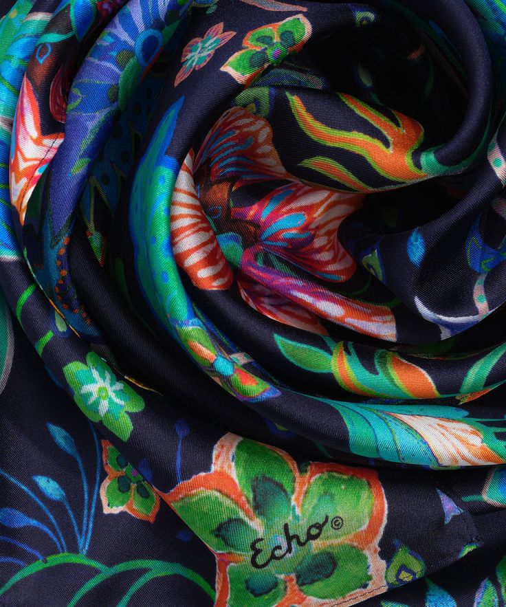 This versatile, 100% silk scarf adds a colorful floral pop to a spring or summer ensemble. Wear it as a flowing head wrap, tie it around the neck or even wear it as an eye-catching belt. Dimensions: 13 in. x 72 in.Materials: 100% Silk Silk Scarves With Floral Print For Spring, Elegant Multicolor Scarves For Summer, Elegant Multicolor Summer Scarves, Bohemian Multicolor Silk Scarves, Multicolor Silk Scarf For Spring Beach, Summer Multicolor Silk Headscarf, Black Bohemian Scarf With Floral Print, Black Silk Scarf With Floral Print, Multicolor Silk Headscarf For Summer