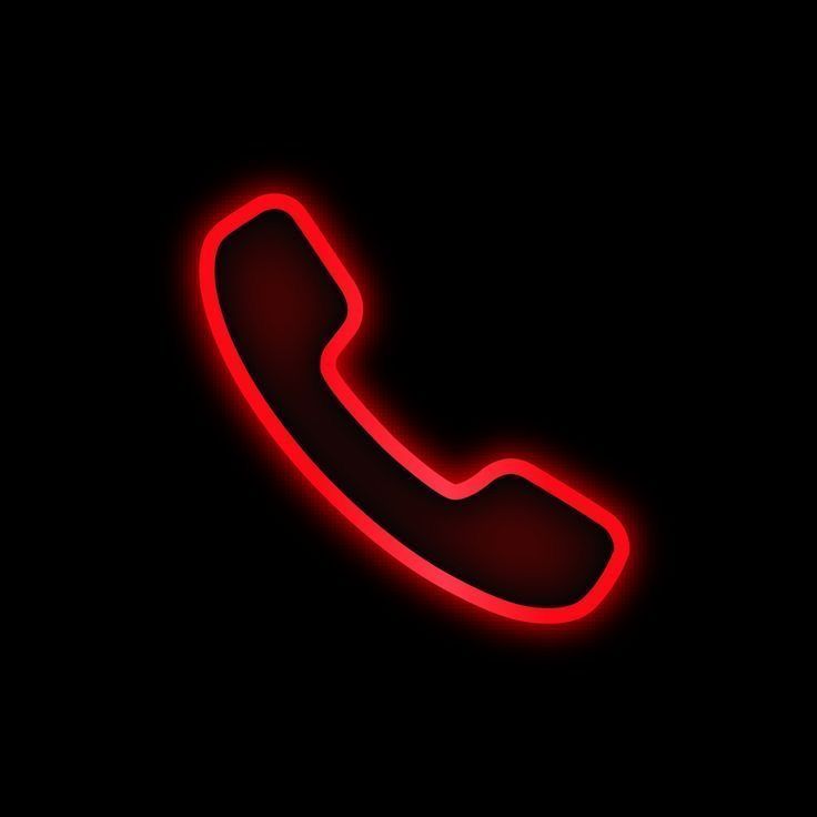 a red neon phone on a black background