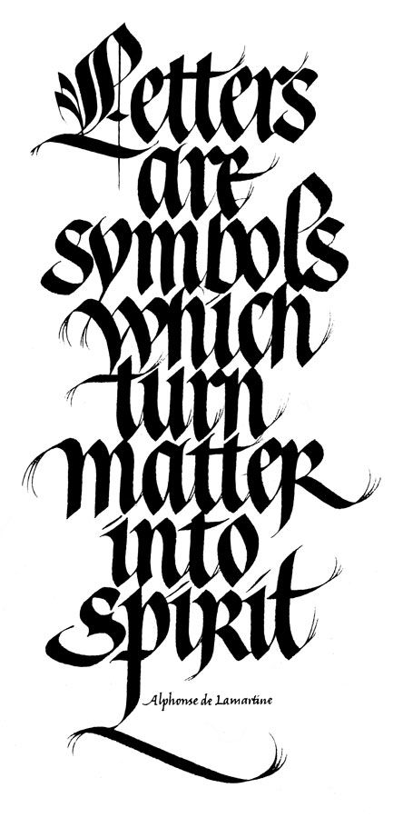 some type of lettering that looks like it is made out of black and white ink