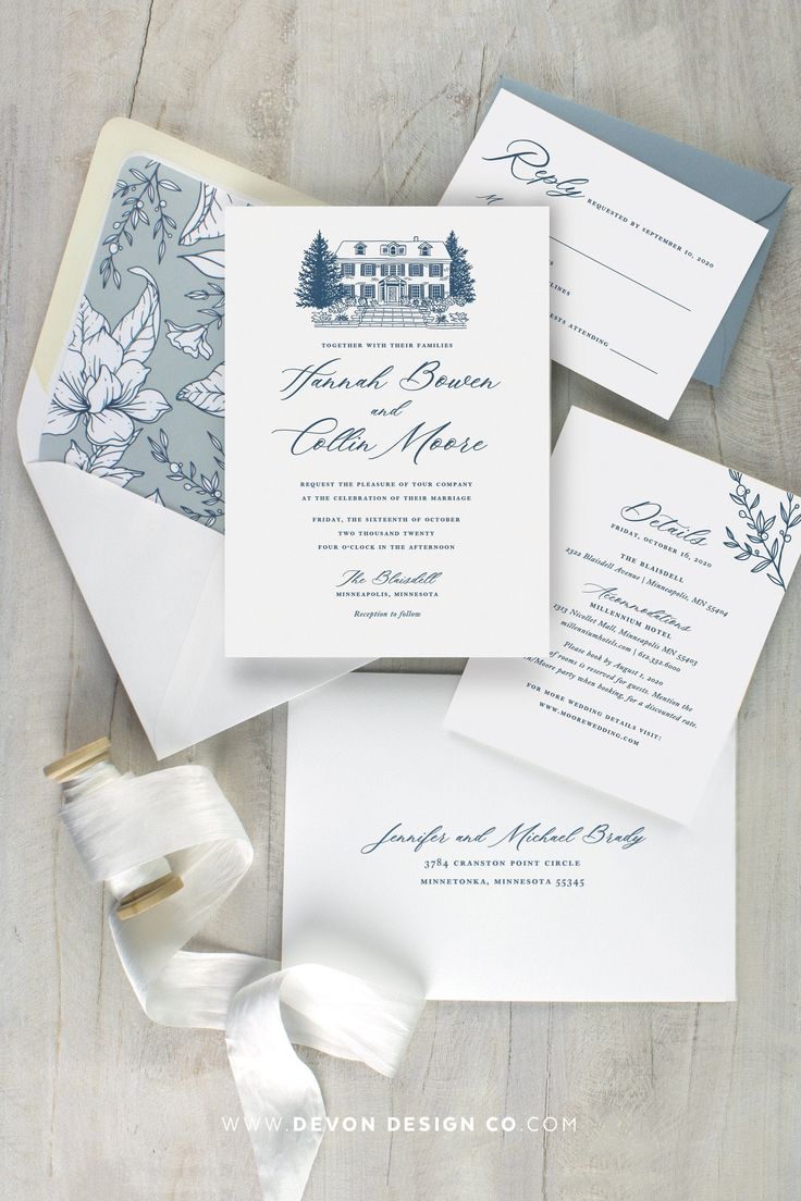 the wedding stationery is laid out on top of each other