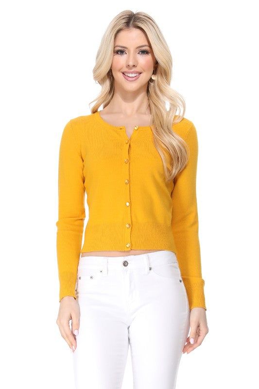 - 18"-19" Length, Crewneck, Long Sleeves, Rounded Jewel Buttons, Button Down, Basic and Classic Viscose Crop Cardigan Sweater for Women.- Lightweight Knit Cardigan Bolero Shrug Sweater with High Quality Soft Viscose with Stretch.- Various Vivid and Solid Color Choices with Sizes: Small, Medium, Large, and X-Large.- Versatile and Perfect for Any Occasion: School, Office, Parties, or Everyday Wear.- Matches Well with Swing Skirts, Vintage Style Skirts, Dresses, Shirts and Pants.Made In: ChinaFabri Classic Stretch Cardigan For Fall, Trendy Stretch Button-up Cardigan, Fitted Cardigan With Snap Buttons For Work, Fitted Workwear Cardigan With Snap Buttons, Fall Stretch Cardigan With Button Closure, Fitted Snap Button Cardigan For Work, Fitted Spring Sweater With Buttons, Fitted Solid Cardigan With Button Closure, Fitted Button-up Spring Cardigan