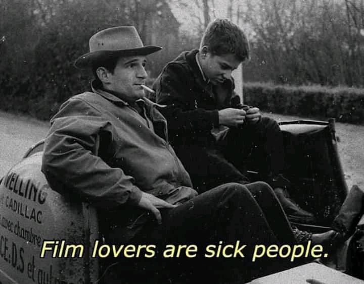 two men sitting in the back of a truck with a quote on it that reads, film lovers are sick people