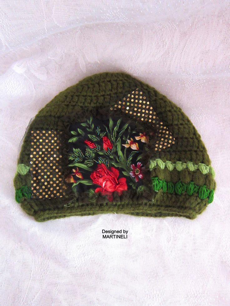 This green embroidered beanie hat is designed and handmade by me. The wool crochet beanie is made of very soft olive green angora wool yarns, floral patches,sequins fabric,Preciosa glass beads. Hat trim circumference: About 48 cm/ 19 inches This winter boho woman beanie is very lightweight,stretchy and comfortable!Machine wash on a gentle program. This unique handmade hat could be your jewelry, fashion accessory and stylish accent. It`s exclusive,one of a kind,because I don`t make more than one Green Crochet Beanie Hat, One Size, Handmade Green Crochet Hat For Winter, Green Crochet Beanie Hat (one Size Fits Most), Green One Size Beanie Crochet Hat, Green Hand Knitted Beanie Cap, Green Hand Knitted Beanie, Green Crochet Beanie Hat, Hand Knitted Green Beanie, Green Crochet Beanie One Size